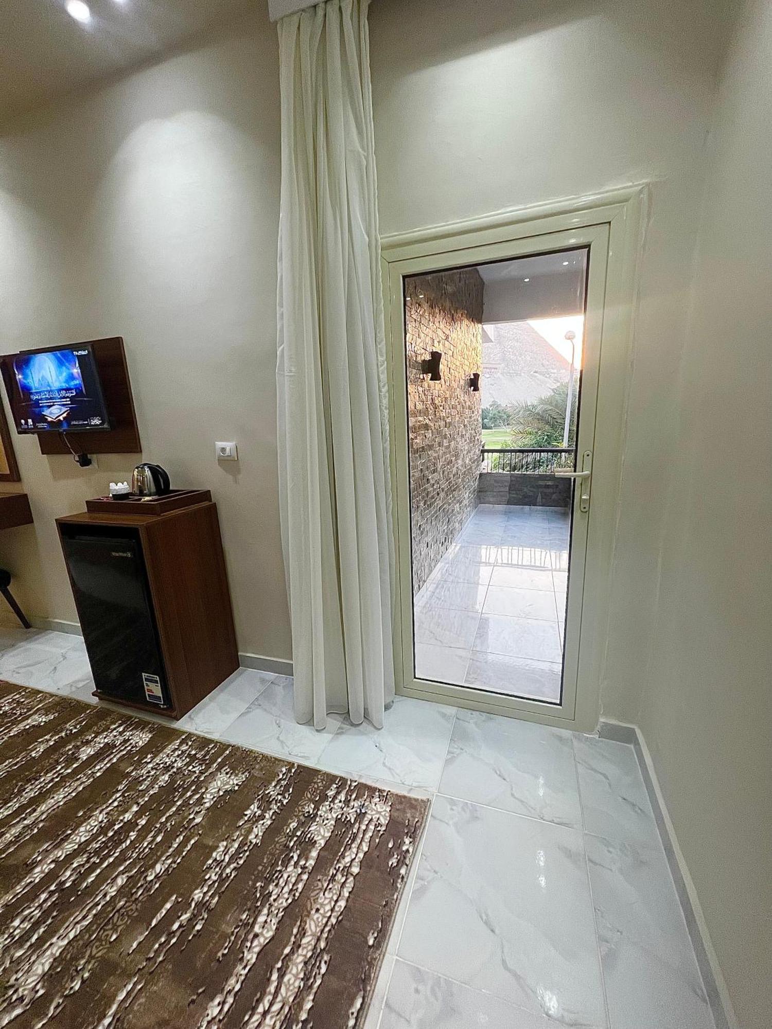 New Glamour Pyramids Hotel Kafret el-Gabal Esterno foto